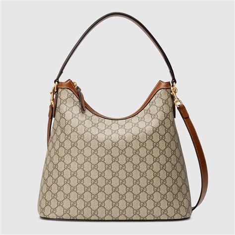 tessuto lucido gucci gg 2 manici stemma con madonna|Borse con manici Gucci da donna .